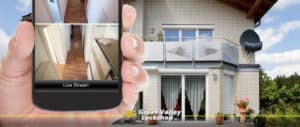 Homeowner looks at security cameras using a mobile app.