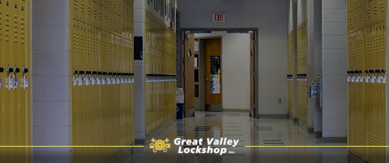 The hallway of a school and an open classroom door.