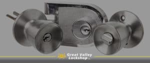 Selection of three new door locks and hardware for commercial use.
