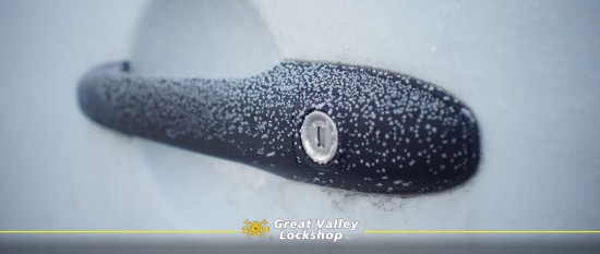Ice is visible on a car door lock.