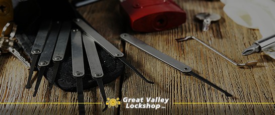 Locksmith tools scattered on a table.