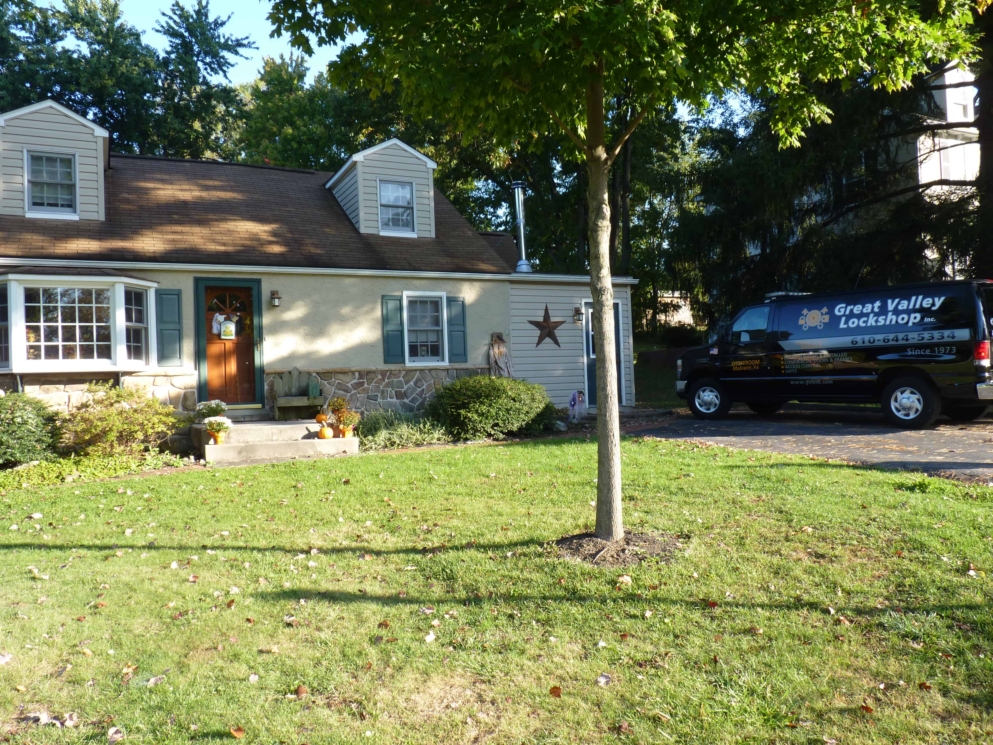 residential locksmith arriving at house